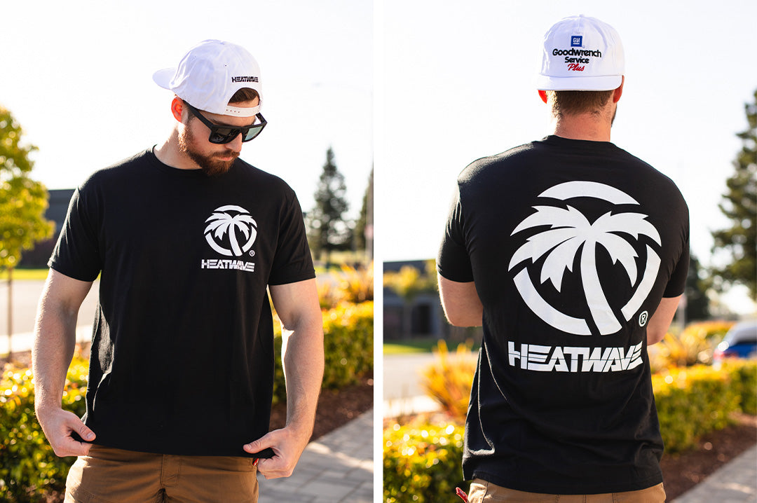 Caden wearing the Heat Wave Visual Billboard black t-shirt.