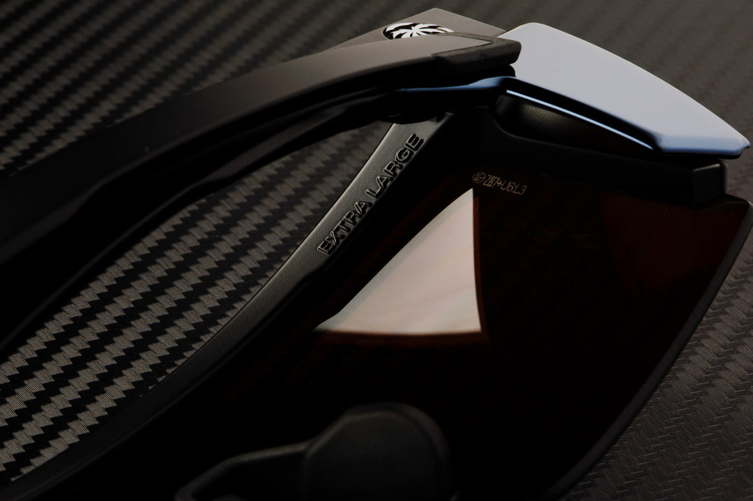 Close up of the Heat Wave Visual Performance XL Lazer Face extra large lettering on the inner frame.